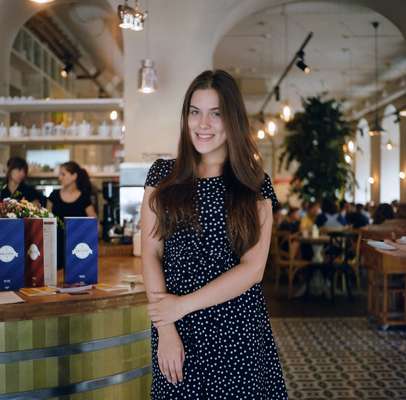 A waitress at Biblioteka Restaurant