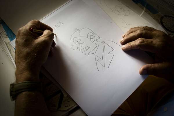 Giannelli sketches his favourite subject, Silvio Berlusconi
