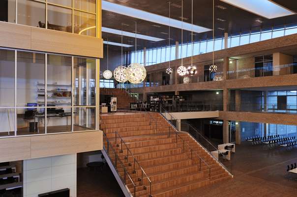 Central wooden staircase that doubles as seating for shows and assemblies