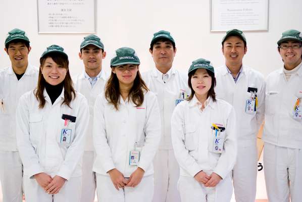 Workers at the new Honda motorcycle factory in Kumamoto