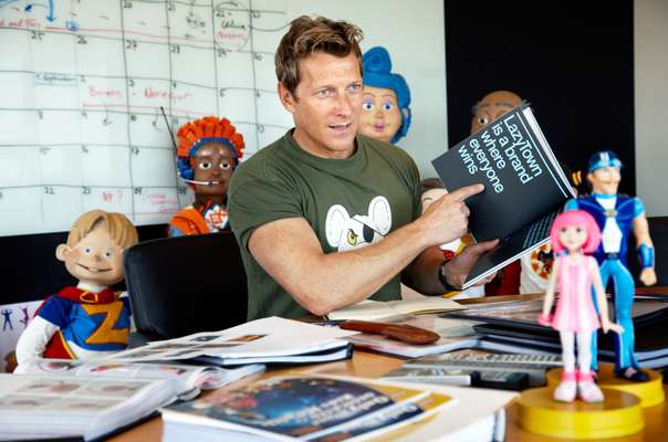 Magnus Scheving in LazyTown studios surrounded by his characters