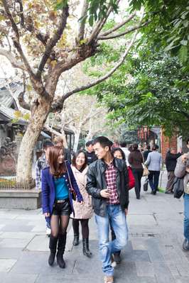 Shoppers strolling in the pedestrianised preservation area of Kuanzhai Alleys 