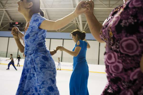 Skaters hold hands at Ashgabat’s ice rink