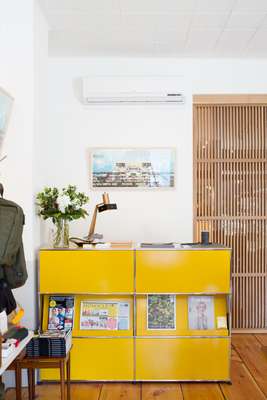 Staff sit behind The Monocle Shop USM counter