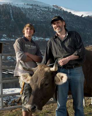 Imfield with his son Samuel and Erika the pregnant cow