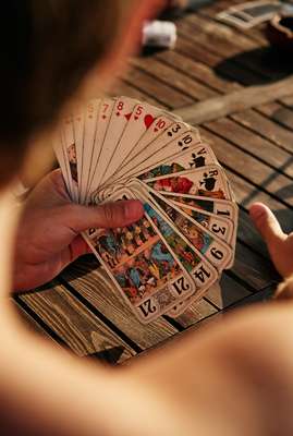 Students play a game of Tarot