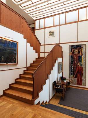 Staircase leading up to second-floor private sleeping quarters