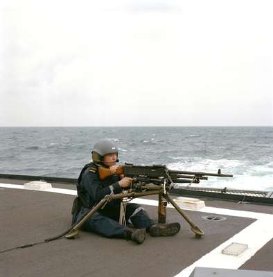 Manning a machine-gun on the heli-deck