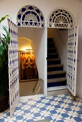 Stained-glass doors in a hallway