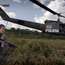 A helicopter lands in territory controlled by the guerilla group Farc