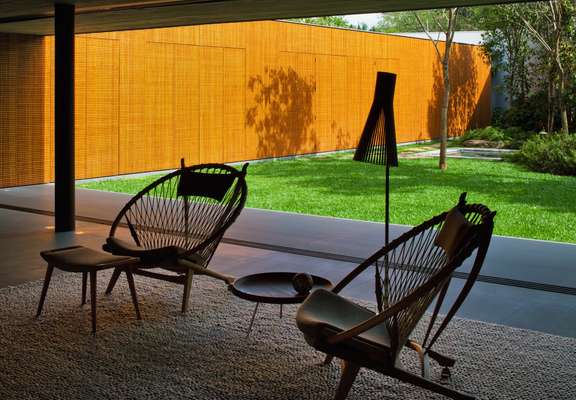 Hans Wegner Circle Chairs sit throughout the living room