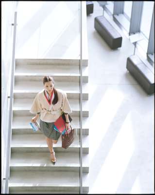 Jacket by Bottega Veneta, cardigan by Yves Saint Laurent, skirt by Knott Galerie Vie from Galerie Vie, shoes by Ralph Lauren, stole by Jean Paul Knott from Galerie Vie, bracelet by Louis Vuitton, bag by Junya Watanabe Comme des Garçons