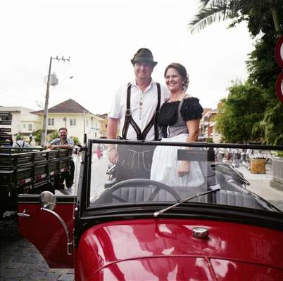 Rolf Nicolodelli, mayor of Pomerode (left), wears his best lederhosen at the annual Festa Pomerana