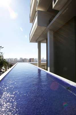 A mill-pond water  pool encircles the building