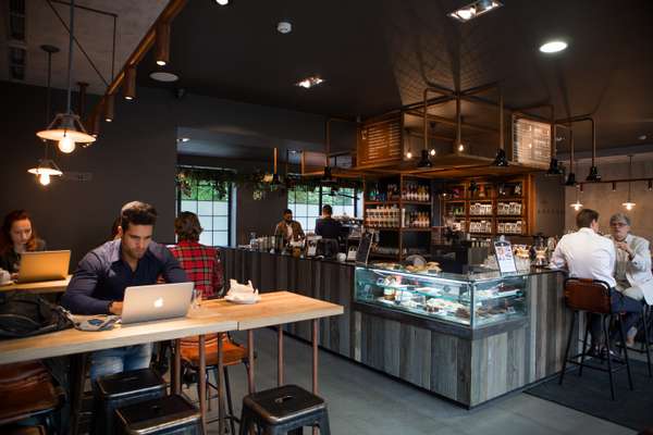 Freelancers working at the Sviezia Kava coffee bar