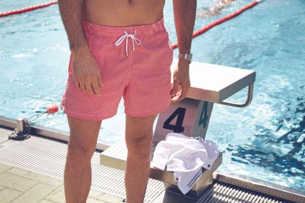Swim trunks by Canali, watch by Audemars Piguet, polo shirt by Zegna Sport