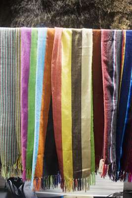 Scarves at the Monitaly stand handwoven by indigenous Mexicans