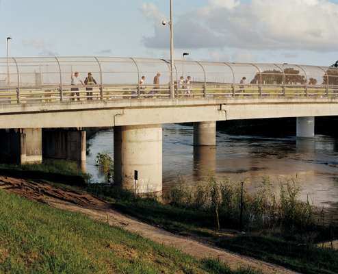 Mexicans crossing the bridge 