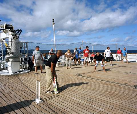 Officers against passengers cricket match