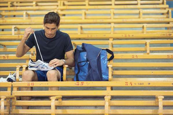 T-shirt by Dunhill, shorts by Asics, shoes by Asics, jacket by Sanca, bag by Porter, watch by Seiko