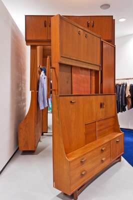 Cupboards designed by Michael Samuels double as fitting rooms