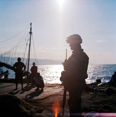 Early evening light on patrol in the wharf area of Cité Soleil