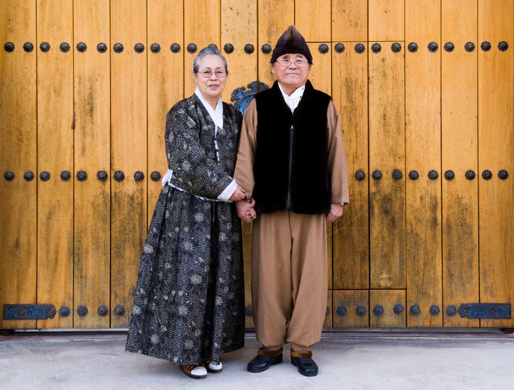 Lee Bong-ju and his wife, the designer Sa Jun-ja, wearing traditional formal dress 