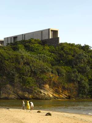 A beach below the house