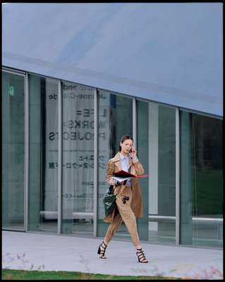 Coat & trousers by Ralph Lauren Black Label, shirt by Comme des Garçons, bag & keyring by Louis Vuitton, shoes by Fabio Rusconi from Beams Ginza, glasses by Alain Mikli