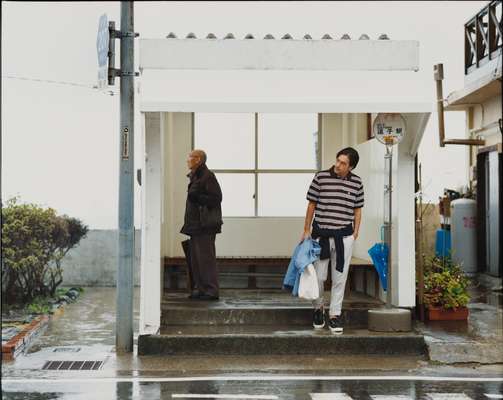 4. Polo shirt by Brooks Brothers, trousers by Incotex at United Arrows, sweater by Sigi, cotton coat by Traditional Weather Wear at Beams Harajuku, bag and deck shoes by Visvim