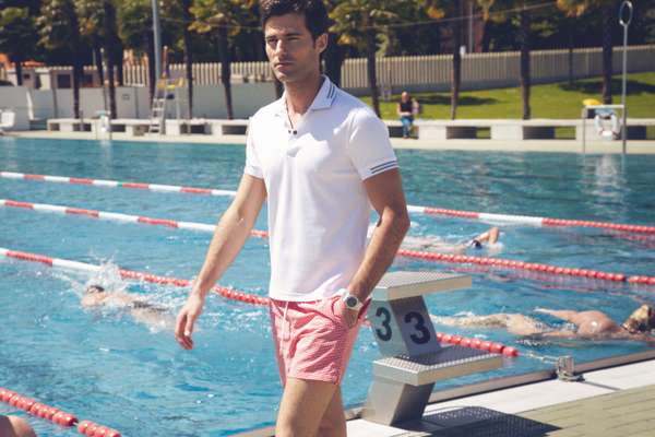 Polo shirt by Zegna Sport, swim trunks by Canali, watch by Audemars Piguet