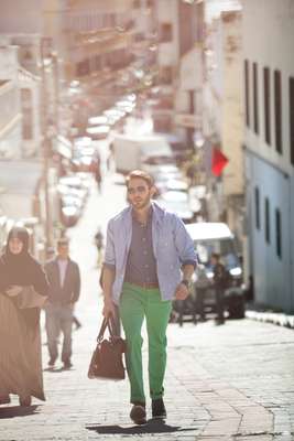 Sunglasses by Oliver Peoples, jacket by Post O’alls, shirt by Hackett, watch by Bell & Ross, belt and trousers by Polo Ralph Lauren, shoes by Oliver Spencer, bag by Dunhill