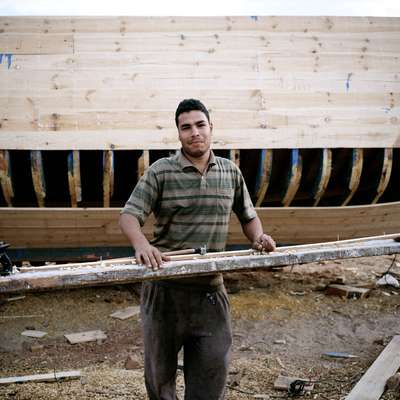 Worker at ship building yard along Suez Canal