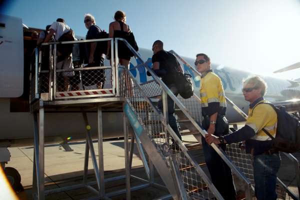 FIFOS board a plane in Perth