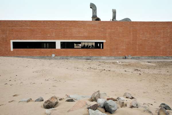 Cooking school’s brick building sits on a desert mountain