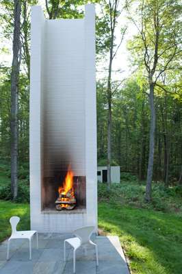 Fire place with sauna behind