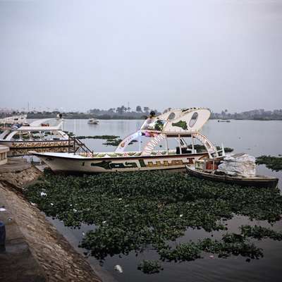 Small entertainment boats on lake next to Suez Canal