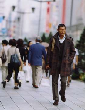 Coat by Bottega Veneta, jumper by Steven Alan from Beauty & Youth United Arrows Shibuya Koendori, shirt by Boss Selection, trousers by Bottega Veneta, bag by J&M Davidson, shoes by Nepenthes, gloves by Dunhill