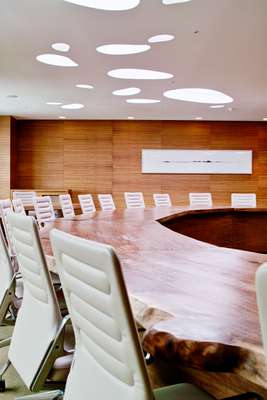 Natural materials are used throughout – the conference room has a custom-made desk and Antonio Citterio’s AC 4 chairs for Vitra