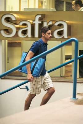 Polo shirt by Scye Basics, shorts by United Arrows, bag by Porter