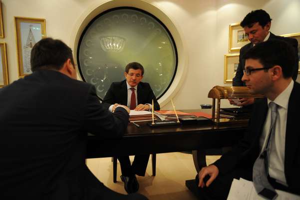 Davutoglu with an aide