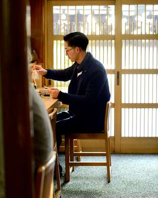  Jacket by Lardini for Strasburgo, jumper by Gray for Beams, shirt by G-Star Raw, trousers by Incotex for United Arrows, glasses by Savile Row, shoes by Paraboot**For lunch:**  Salt-grilled mackeral set meal at Sue Zen in Daikanyama