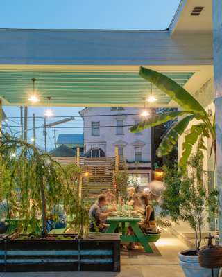 Diners enjoying a balmy evening at Xiao Bao Biscuit