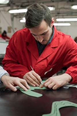 Valle cuts a calf leather for a shoe’s upper