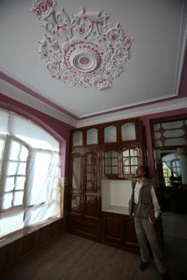 Architect Abdul Baki Garder inspects the work at one of the Nasiri mansions