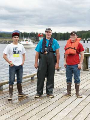 Locals in their Xtratuf boots and life jackets