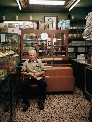 Uc Yildiz sweet shop in Beyoglu, a central neighbourhood of Istanbul, overlooked by a framed photograph of Ataturk
