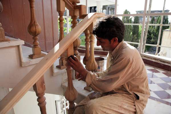 A staircase is stained in the entrance to one of the houses 