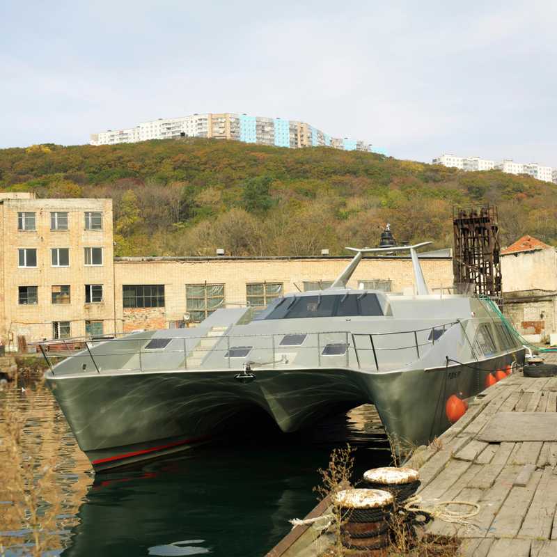Luxury catamaran in old military docks 