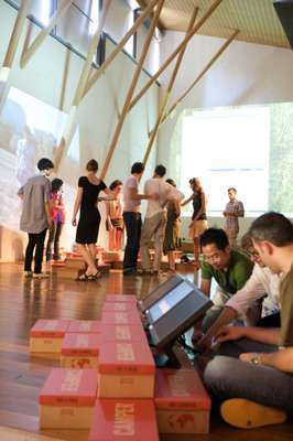 Students prepare a presentation in Rafael Moneo's auditorium